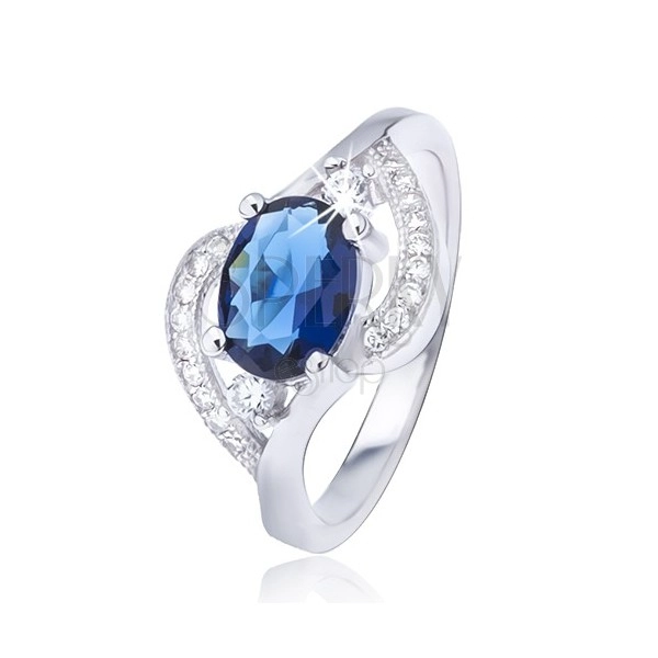 Stříbrný prsten 925 s oválným modrým zirkonem, zvlněná ramena