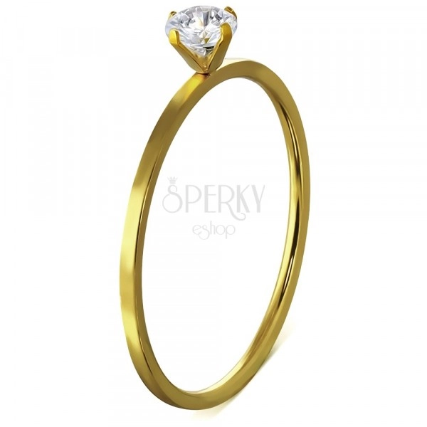 Úzký ocelový prsten, zlatá barva, kamínek uchycený čtyřmi kolíčky