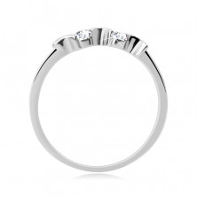 Stříbrný prsten 925 - nepravidelné měsíčky, dva kulaté čiré zirkony