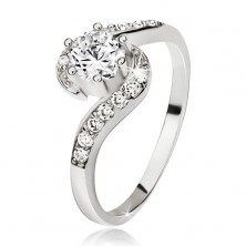 Stříbrný prsten 925, zvlněná zirkonová ramena, kulatý čirý kamínek