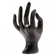Stříbrný prsten, okrouhlý čirý kamínek, zaoblená ramena, zirkonky