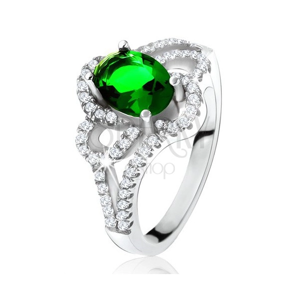 Stříbrný prsten, šikmý oválný zelený zirkon, zaoblené linie, čiré kamínky