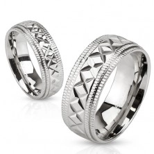 Ocelový prsten stříbrné barvy, geometrické zářezy, vroubky na okrajích, 6 mm