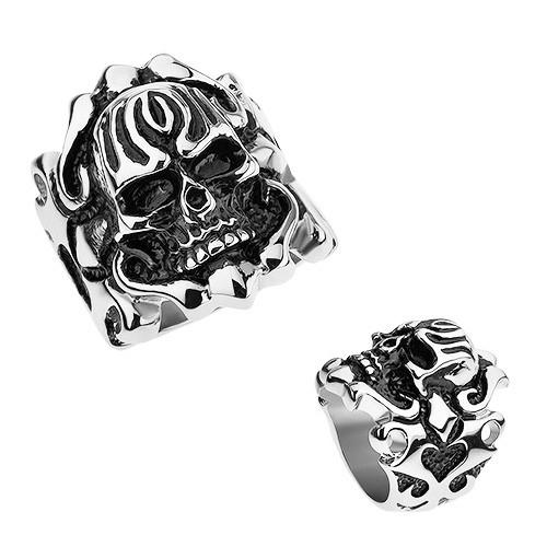 Ocelový patinovaný prsten, vypouklá lebka, ornamenty na ramenech - Velikost: 70