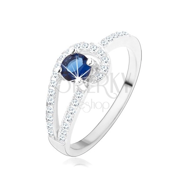 Stříbrný prsten 925, třpytivé linie čiré barvy, kulatý modrý zirkon