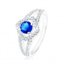 Stříbrný prsten 925, rozdvojená ramena, obrys čtverce, modrý zirkon