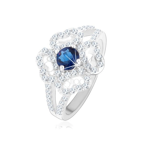 Prsten - stříbro 925, rozdělená ramena, čirý obrys květu, modrý zirkon