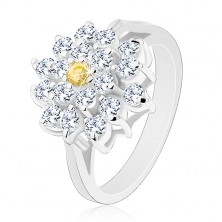 Prsten ve stříbrném odstínu, velký zirkonový květ čiré barvy, žlutý střed