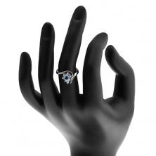 Třpytivý prsten ve stříbrném odstínu, tmavomodrý zirkon, čiré lupínky