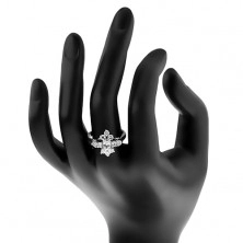 Prsten s lesklými zúženými rameny, čirý broušený ovál a kulaté zirkonky