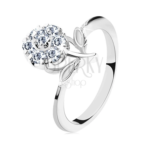 Prsten ve stříbrném odstínu, úzká ramena, třpytivý zirkonový květ čiré barvy