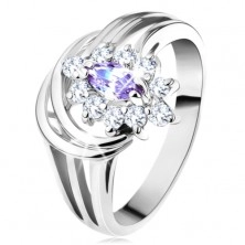 Lesklý prsten se stříbrnou barvou, světle fialové zrnko s čirými lupínky