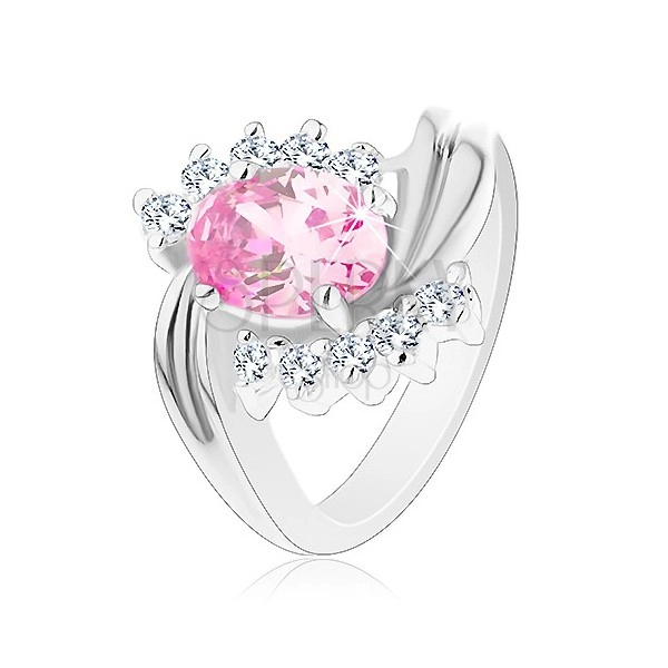 Prsten stříbrné barvy, zvlněné linie ramen, růžový broušený ovál, čiré zirkonky