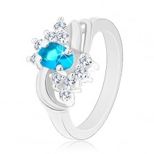 Prsten se zúženými hladkými rameny, modrý oválný zirkon, dva páry oblouků