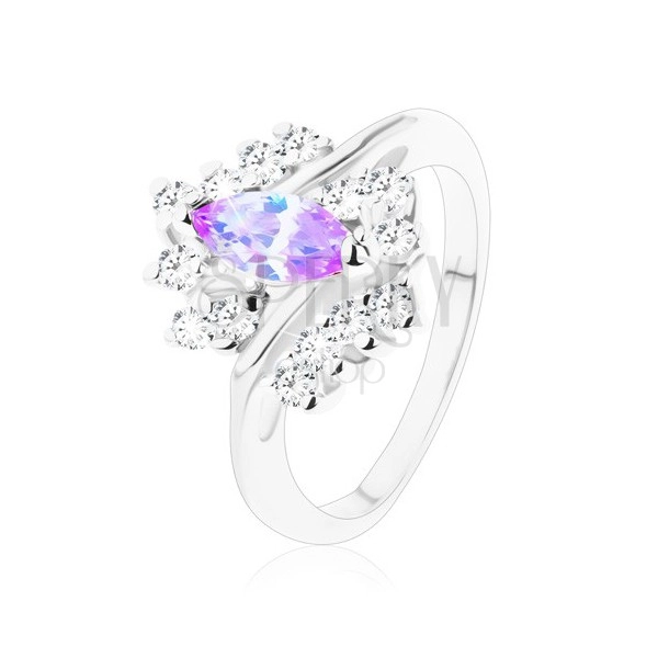 Třpytivý prsten se světle fialovým zrnkem, zvlněná řada čirých zirkonů