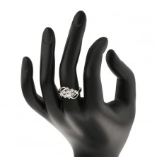 Lesklý prsten s ohnutými rameny se zářezem, kulatý střed, čiré zirkonky