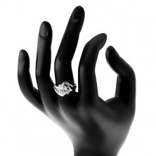Blýskavý prsten, rozdělená zvlněná ramena, velký oválný zirkon čiré barvy
