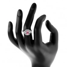 Prsten ve stříbrném odstínu, broušený ovál růžové barvy, čiré zirkonové oblouky