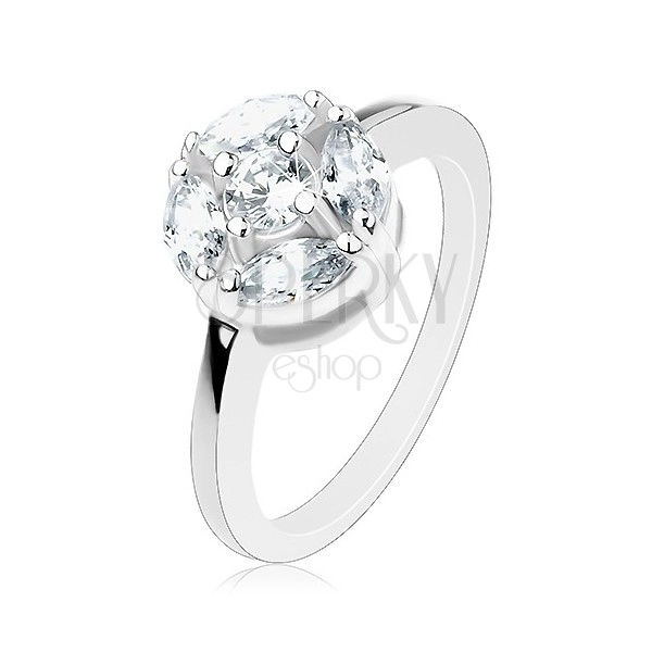 Lesklý prsten stříbrné barvy, kruh zdobený čirými zrnky a kulatým zirkonem