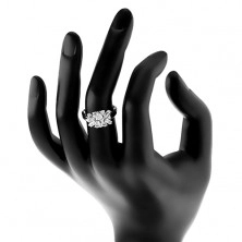 Třpytivý prsten - ramena s vroubkem, čiré zrno, kulaté a podlouhlé zirkony