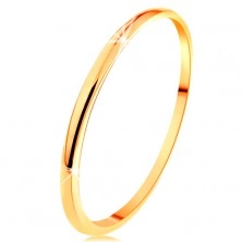 Tenký prsten ve žlutém 14K zlatě, hladký a mírně vypouklý povrch