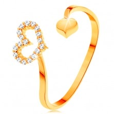 Zlatý prsten 585 - zvlněná ramena ukončená obrysem srdce a plným srdíčkem