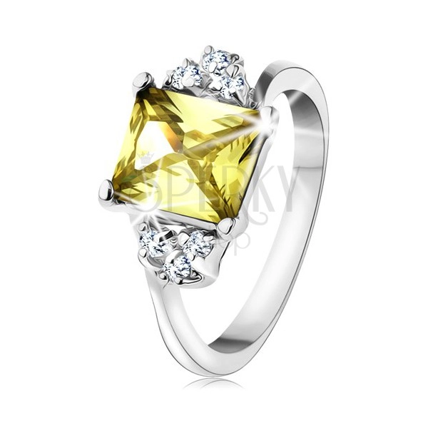 Prsten ve stříbrném odstínu, obdélníkový zirkon ve žlutozelené barvě