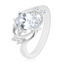 Prsten ve stříbrném odstínu, úzké oblouky, barevný oválný zirkon