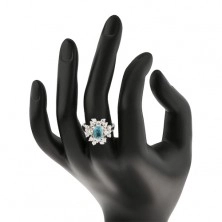 Prsten ve stříbrném odstínu, zirkonový obdélník lemovaný čirými zirkony