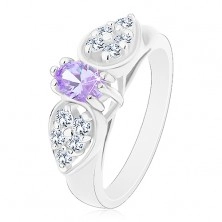 Prsten ve stříbrném odstínu, blýskavá mašlička se světle fialovým oválem