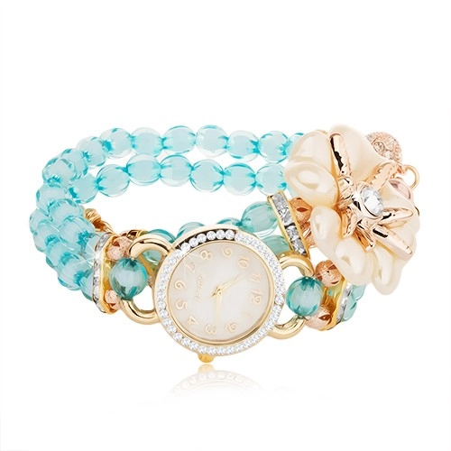 Levně Náramkové hodinky z modrých korálků, ciferník se zirkony, bílý květ