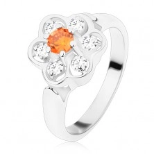Prsten ve stříbrném odstínu, blýskavý čirý kvítek s oranžovým středem
