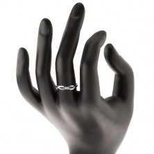 Prsten v bílém 14K zlatě s čirým zářivým briliantem, lesklá ramena s výřezy