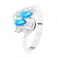 Prsten ve stříbrném odstínu, dvě barevná zrnka a kulaté zirkony čiré barvy