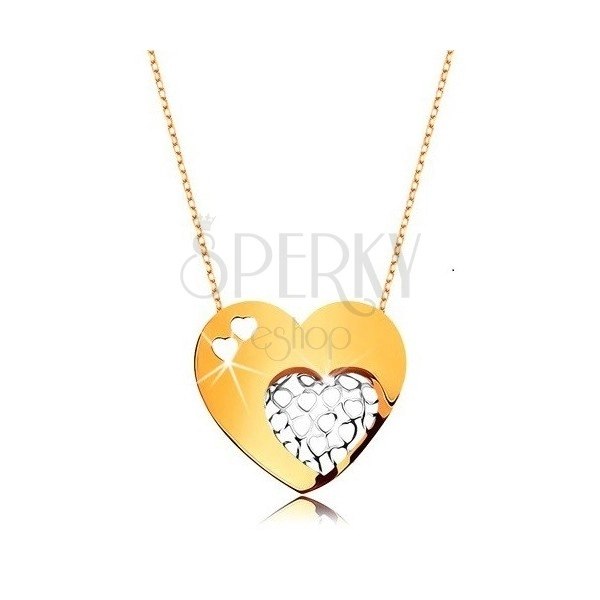 Náhrdelník z 9K zlata - tenký řetízek, velké srdce zdobené výřezy ve tvaru malých srdíček