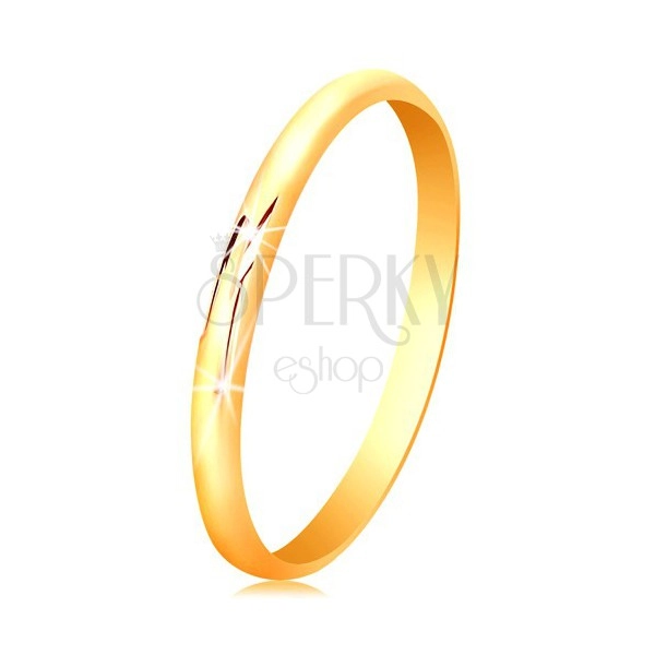 Prsten ve žlutém 14K zlatě, hladký, lesklý a mírně vypouklý povrch