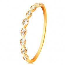 Prsten ve žlutém 14K zlatě - pospojovaná zrnka se vsazenými zirkonky