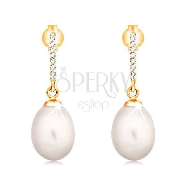 Zlaté 14K náušnice - visící oválná perla bílé barvy, zirkonový oblouk