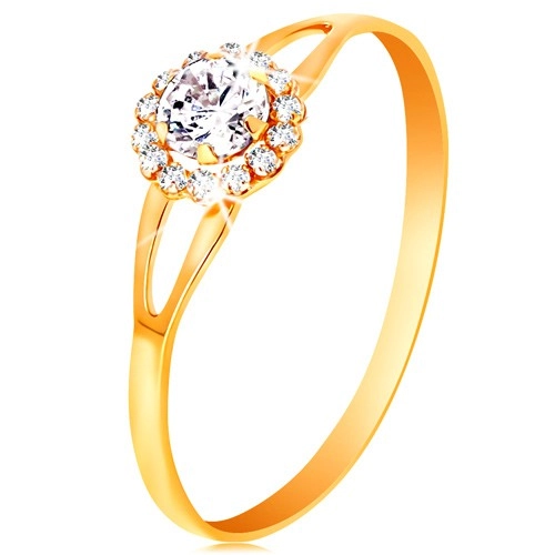 Prsten ve žlutém 14K zlatě - zářivý kvítek z čirých zirkonů, výřezy na ramenech - Velikost: 51