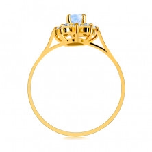 Prsten ze 14K žlutého zlata - oválný topas, linie okvětních lístků, kulaté zirkony