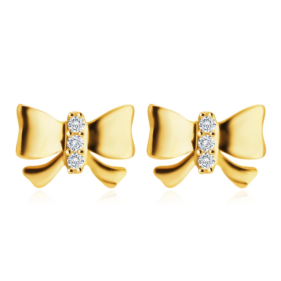 Levně Diamantové náušnice ve žlutém 14K zlatě - mašle s vykládaným středem, brilianty