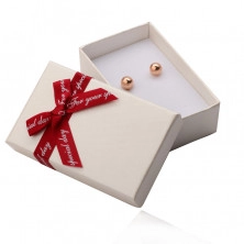 Béžová obdélníková krabička na náušnice a prsten, červená mašlička s nápisem